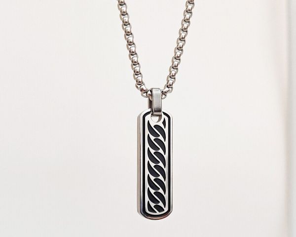 steel pendant on a chain