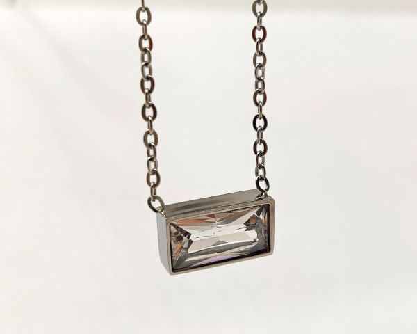 steel pendant on a chain