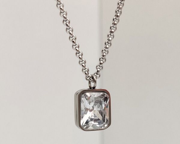 steel pendant on a chain