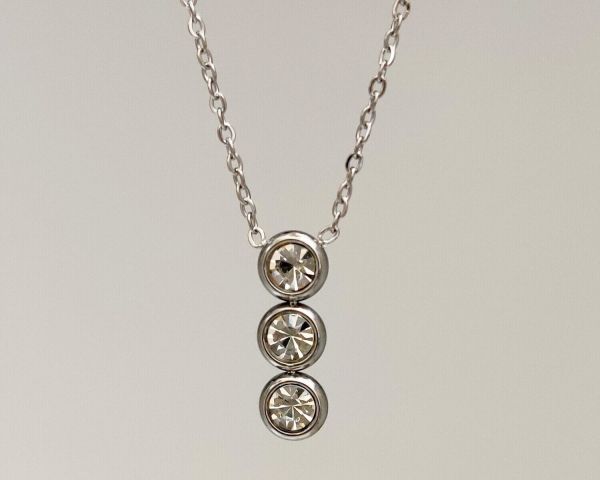 steel pendant on a chain